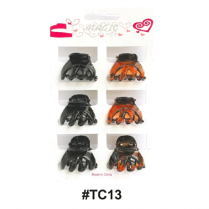 Magic Quality retail display card (Item #TC13) featuring a 6-piece pack of mini curved spider hair claw clips centered on a pure white background. The set is arranged in two vertical columns of three: the left column features solid glossy black clips, and the right column features glossy tortoiseshell amber and black pattern clips. The packaging includes the red heart header at the top and '#TC13' in bold black font at the bottom.