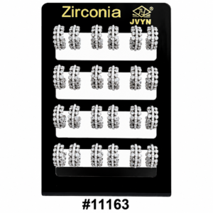 Zirconia black jewelry display board with rows of silver crystal hoop earrings