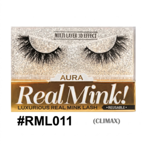 A close-up photograph of a pair of voluminous, black multi-layer 3D effect false eyelashes resting in a clear plastic tray against a shimmering silver glitter background