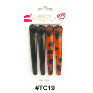 Magic Quality retail card pack (Item #TC19) featuring a 4-piece set of long duckbill hair clips. The set contains two solid glossy black clips and two clips with an amber and black tortoiseshell (leopard) pattern. The packaging includes the red and gray 'MAGIC QUALITY' header logo at the top and '#TC19' printed at the bottom, centered on a pure white background.