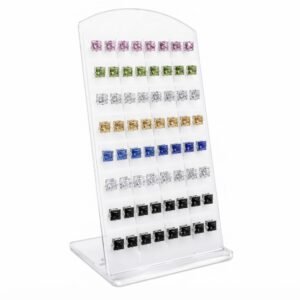 Colourful double sided earrings displayed in an organised stand