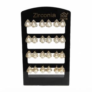 Leaf shaped earrings with pearls on a display card
