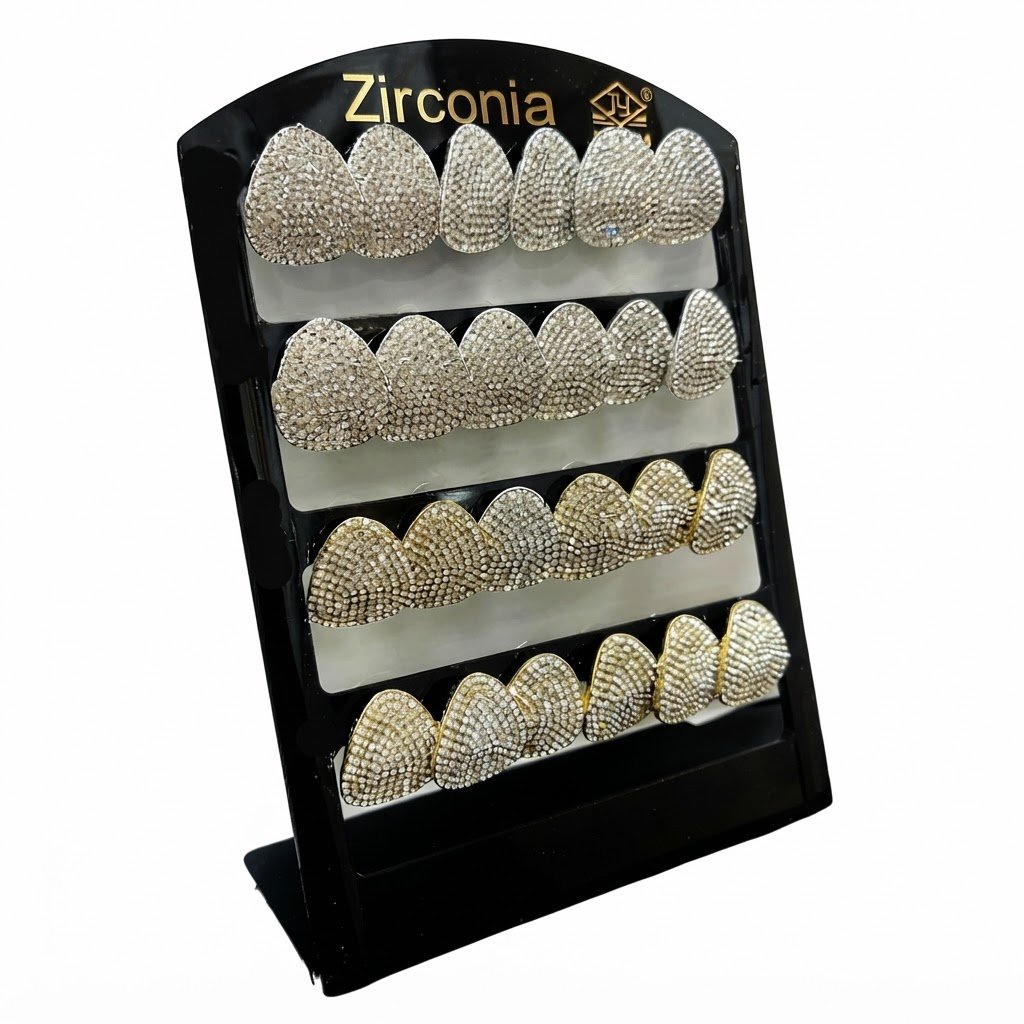 Teardrop shaped stud earrings with sparkling stones displayed elegantly.