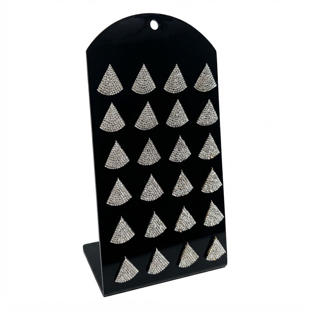Earring Triangle Silver Stone displayed on a stand