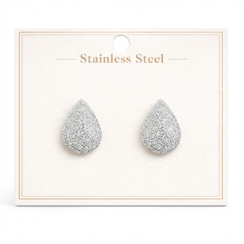 Silver tear-dropped shape earrings in stainless steel