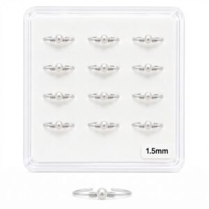 Elegant silver nose stud featuring a pearl design, perfect for body jewellery.
