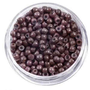 Dark brown nano rings for hair extensions in a clear container